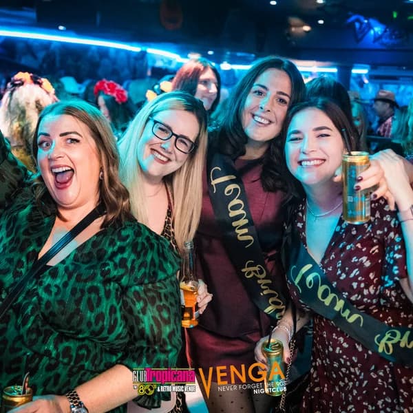 Hen party celebrating with sashes